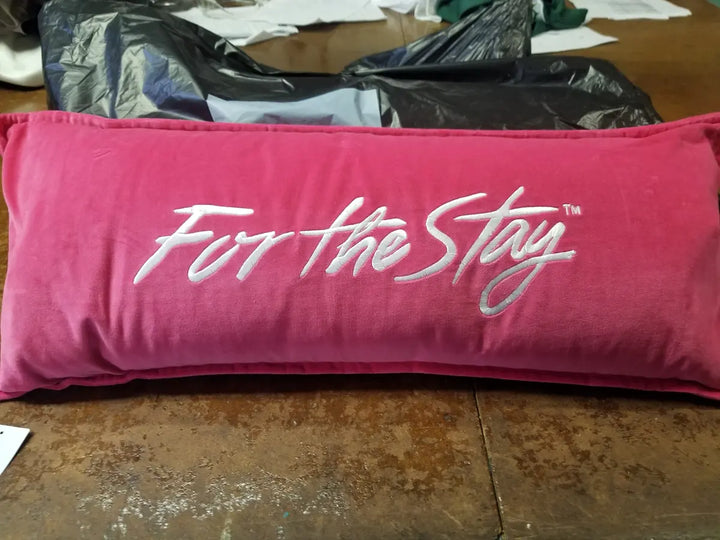 Pink pillow with white For The Stay embroidery by DARTMAR